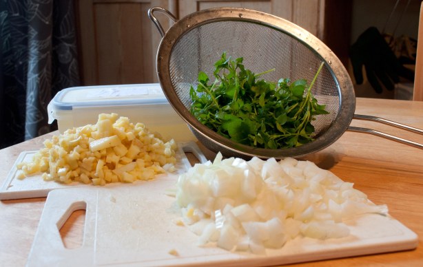 Diced onion, diced potato and chickweed - wash the chickweed well.